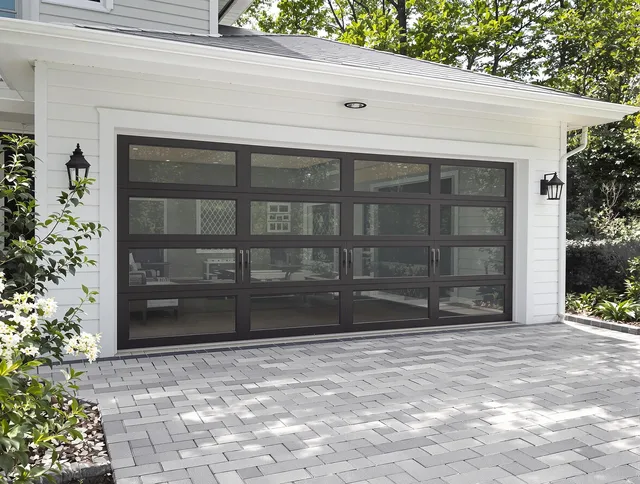 New Britain Garage Door Repair design specialist presenting custom garage door options to New Britain homeowner