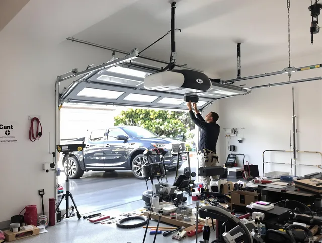 New Britain Garage Door Repair specialist installing smart garage door opener system in New Britain home