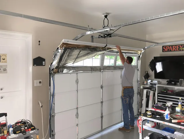 Garage door section replacement by New Britain Garage Door Repair in New Britain