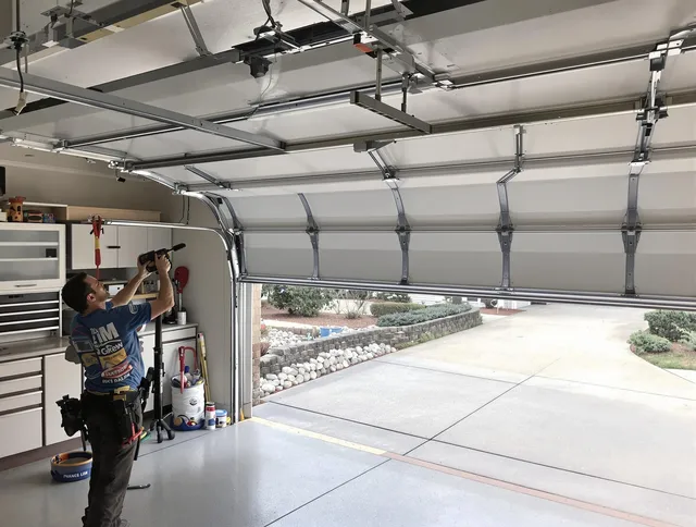 Garage door track repair service by New Britain Garage Door Repair in New Britain